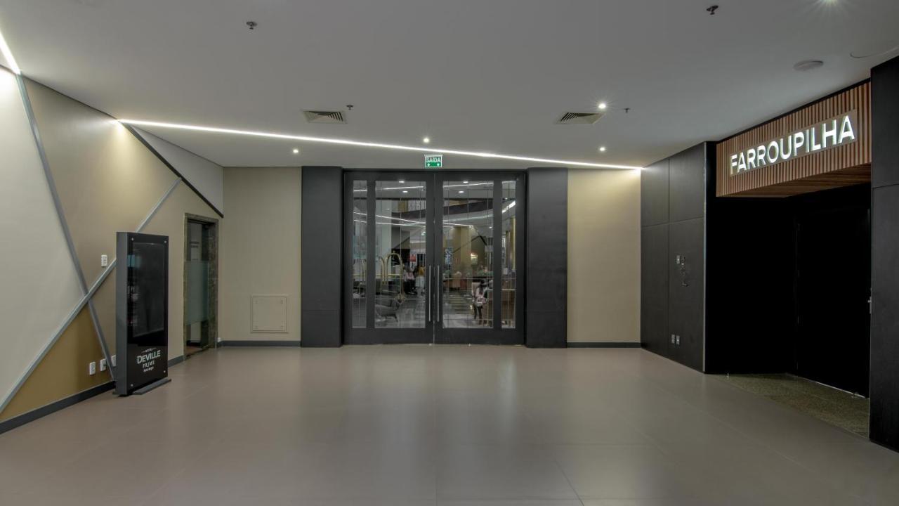 Hotel Deville Prime Porto Alegre Exterior photo Entrance to the Farrouk Lounge